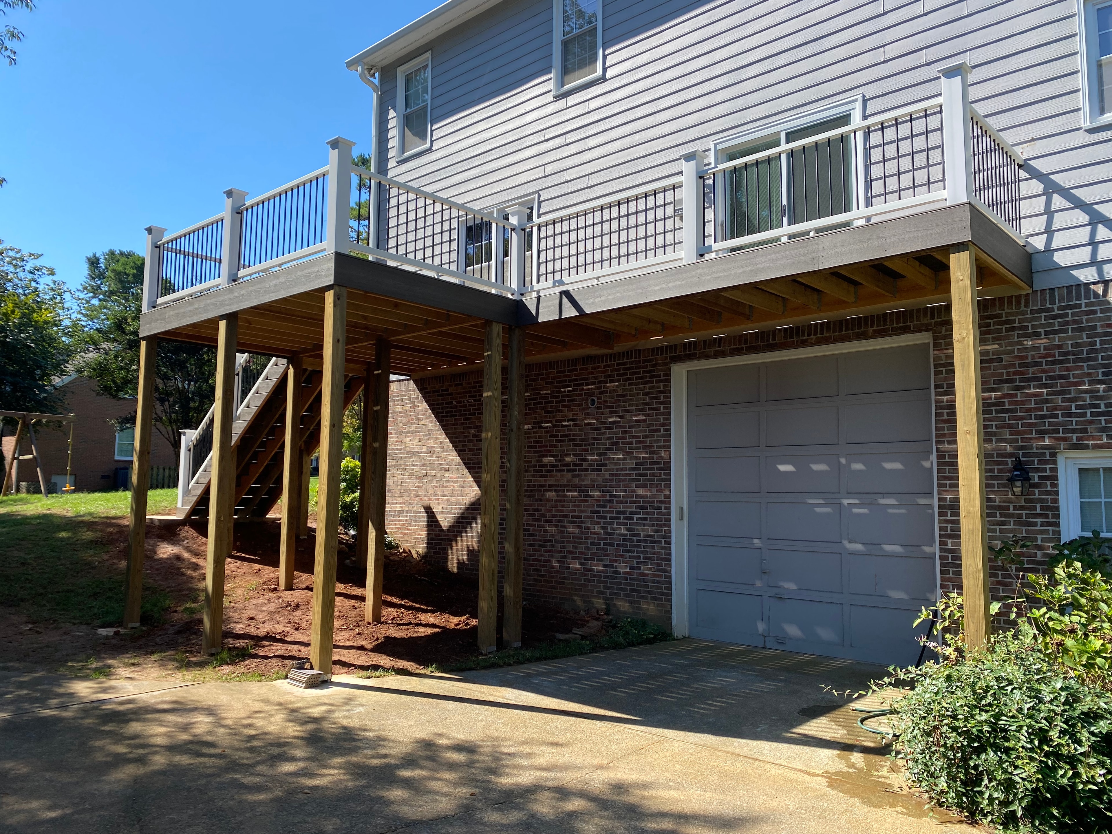 Cascade composite deck rear view showing elevated framing and grade access