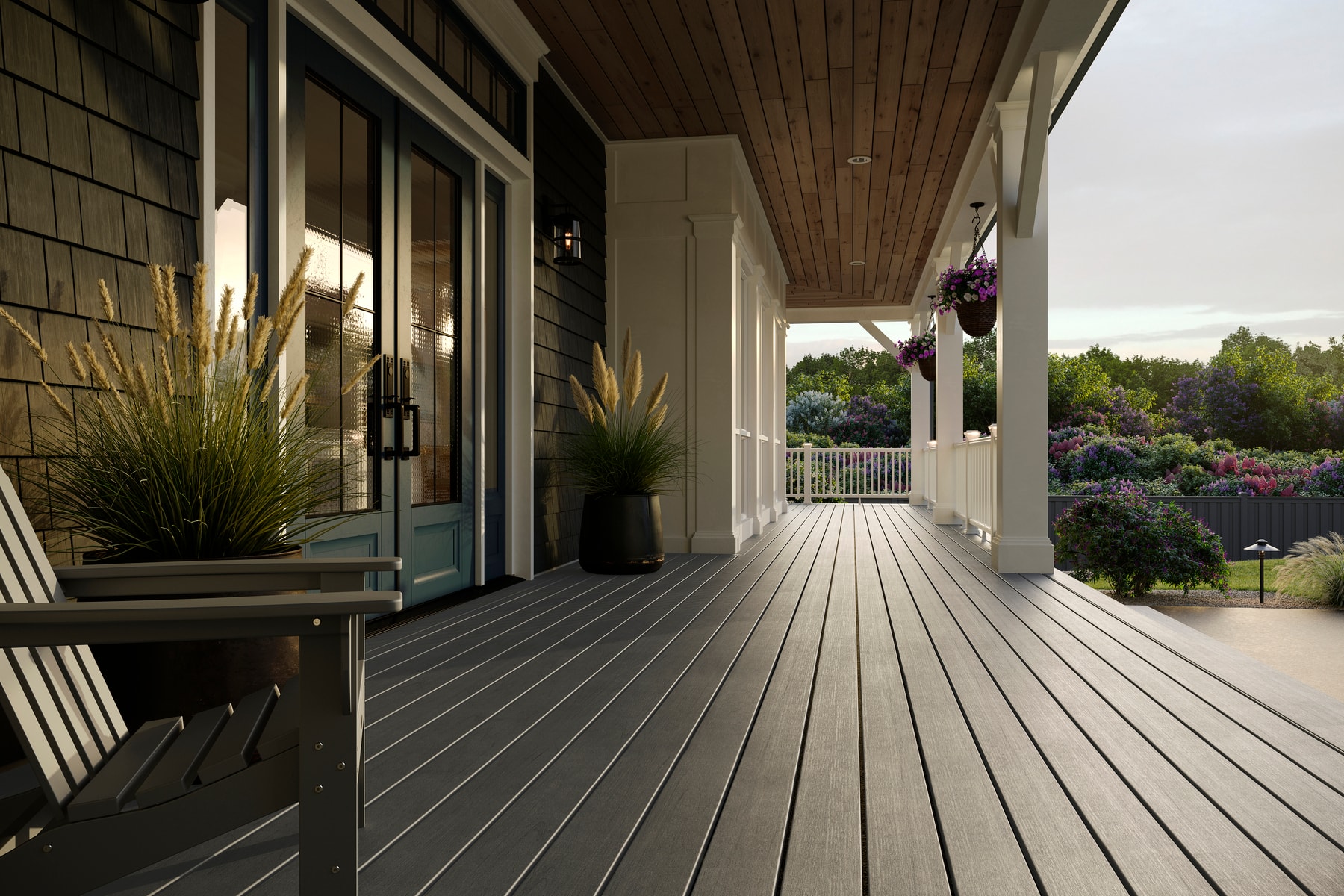 Trex Lineage Cape Cod front porch with Adirondack chairs